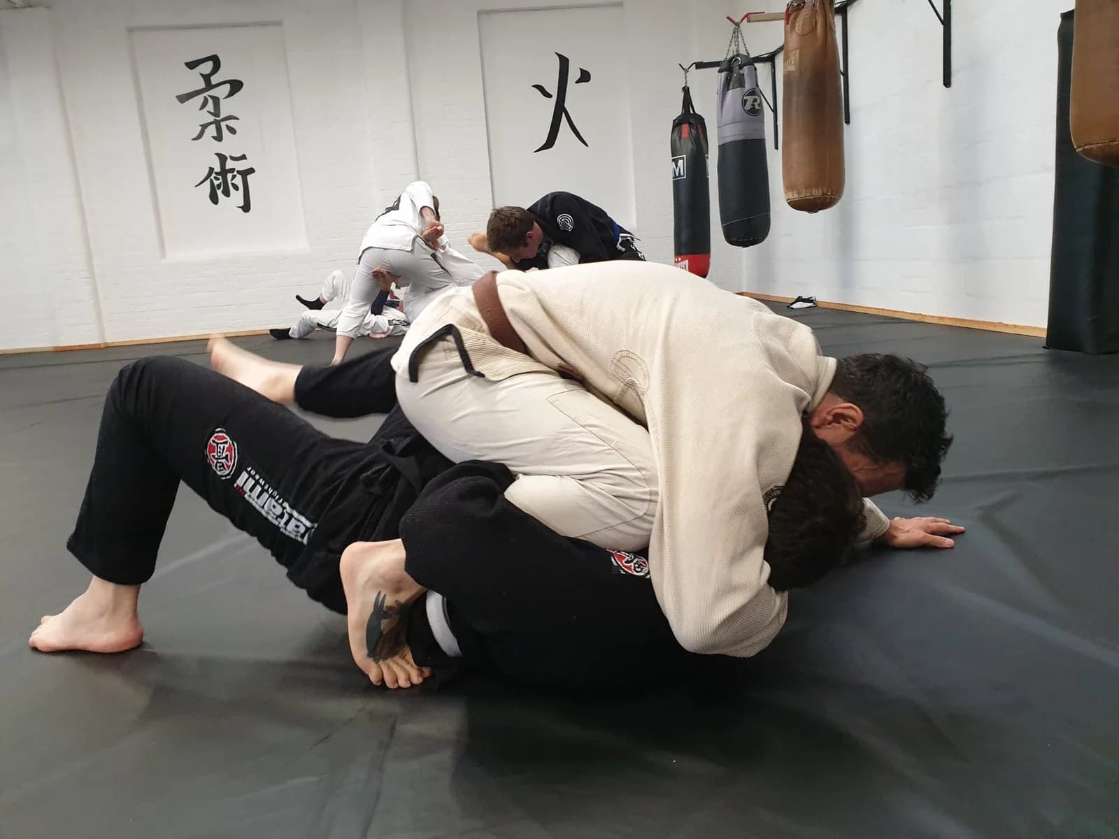 Xplore members practising Brazilian Jiu-Jitsu at UFCC