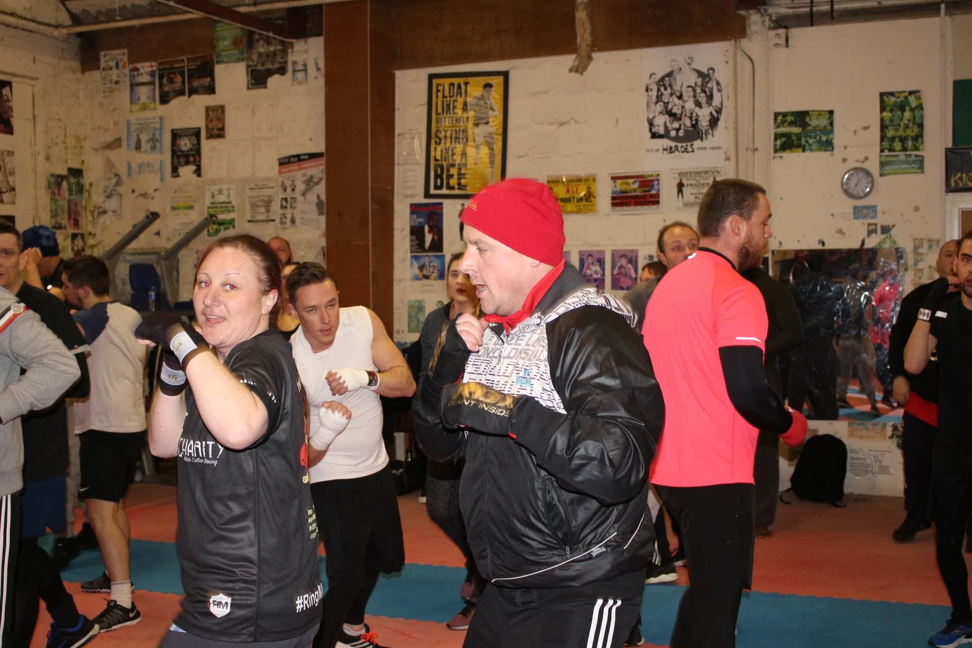Participants practising boxing stances with wrapped hands at UFCC